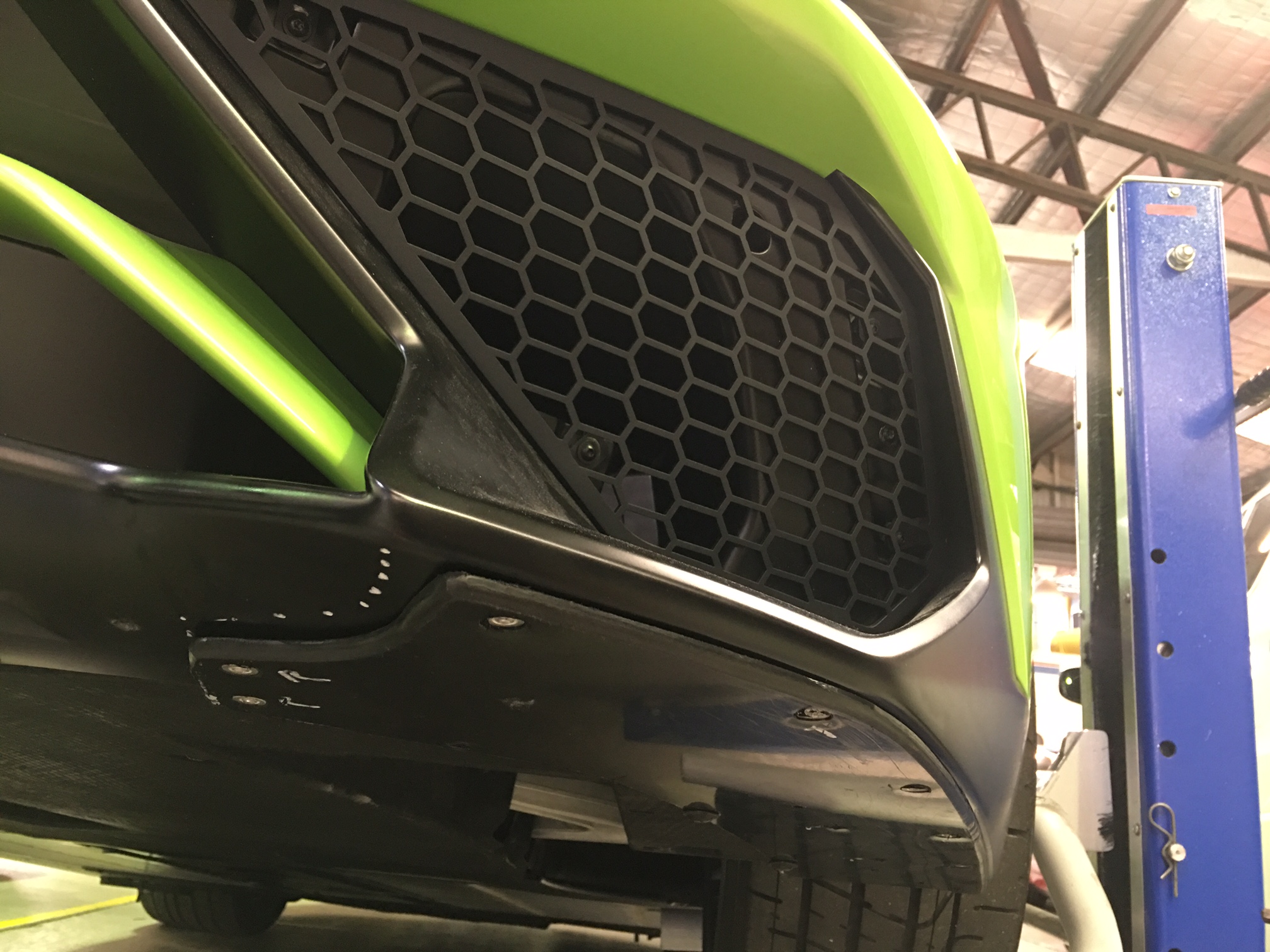 How do I remove the curb rash guard under the front bumper? Archived